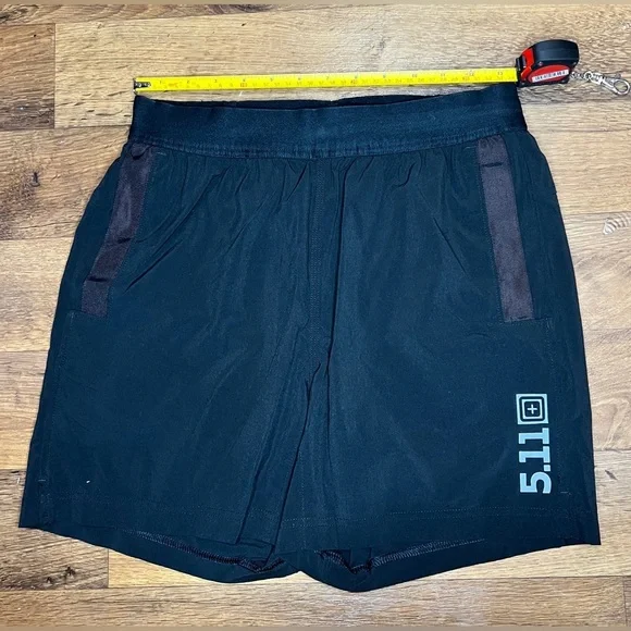 5.11 tactical shorts. Olive green and black waist is 13.25” - Picture 4 of 5